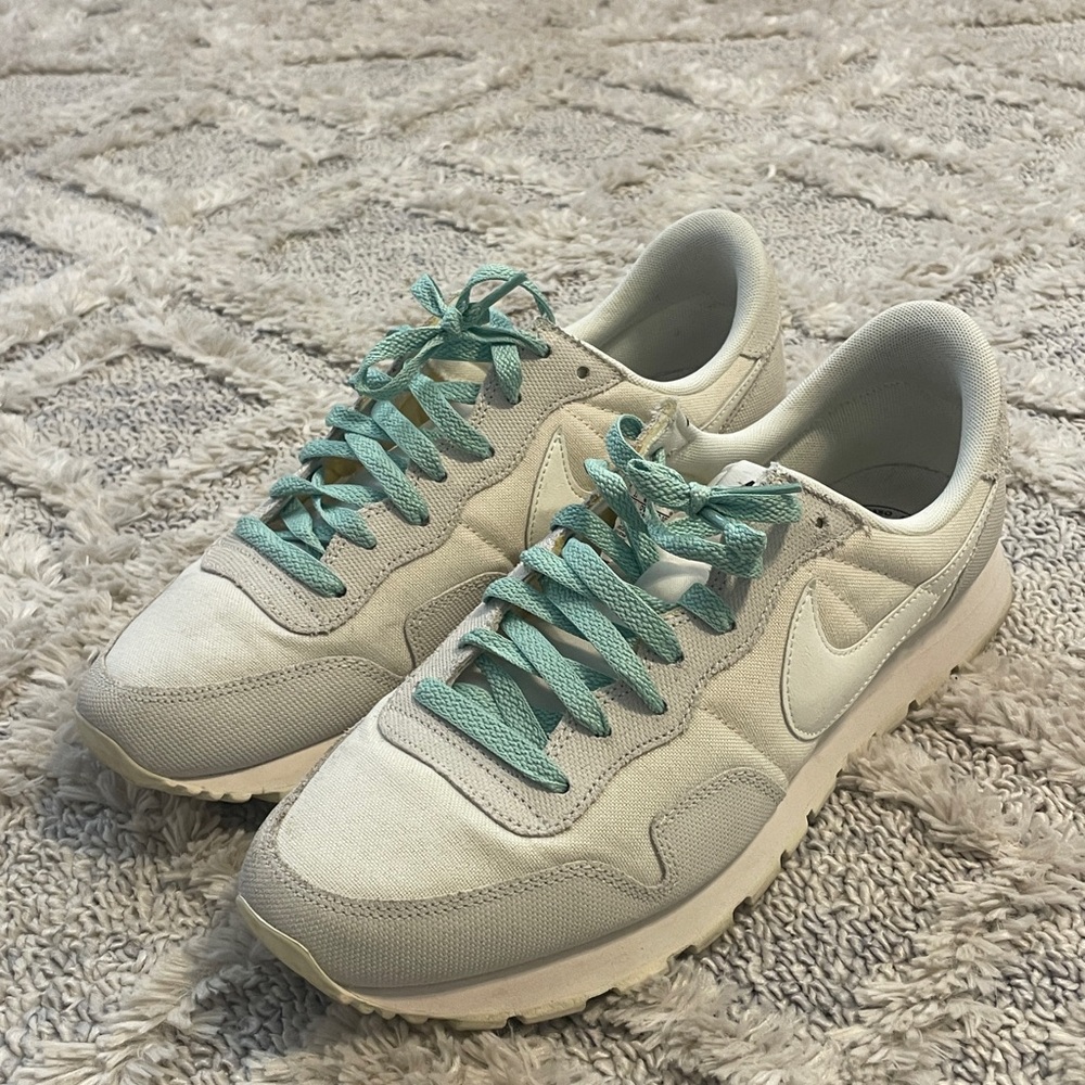Worn Men’s Nike Pegasus Retro Cream Sneakers with Teal Laces